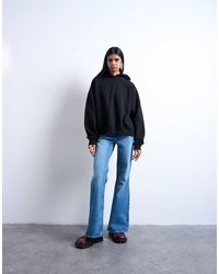 TOPSHOP - Pippa Mid Rise Comfort Stretch Flare Jean - Lyst
