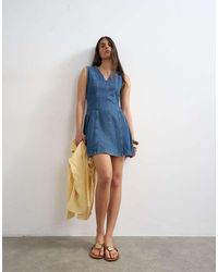 TOPSHOP - Denim Pleated Side Down Mini Dress Rich - Lyst