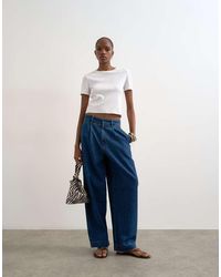 TOPSHOP - Wide Leg Pleated Tailored Jean - Lyst