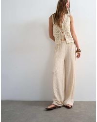 TOPSHOP - Plisse Jersey Straight Leg Trousers - Lyst