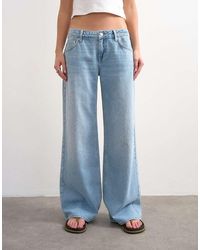 TOPSHOP - Low Rise Wide Leg Jeans - Lyst