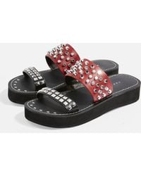 red studded flat sandals