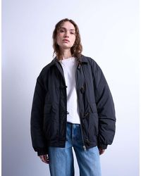 TOPSHOP - Oversized Padded Hybrid toggle Bomber - Lyst