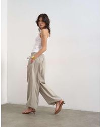 TOPSHOP - Drawcord Tech Fabric Balloon Trousers - Lyst