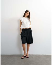 TOPSHOP - Washed Long Line Tie Detail Shorts - Lyst