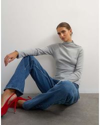 TOPSHOP - Button Detail Funnel Neck Long Sleeve Top - Lyst