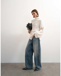 TOPSHOP - Knitted Wool-blend High Neck Roll Seam Detail Oversized Jumper - Lyst