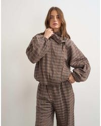 TOPSHOP - Set Check Funnel Neck Bomber - Lyst