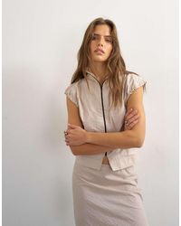 TOPSHOP - Techy High-neck Short-sleeved Zip-through Top - Lyst