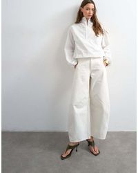 TOPSHOP - Horseshoe Barrel Mid Rise Jeans - Lyst