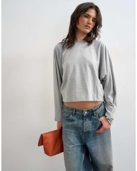 TOPSHOP - Raglan Cinch Cuff Long Sleeve Top - Lyst