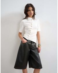 TOPSHOP - High Neck Ruffle Button Through Half Sleeve Top - Lyst