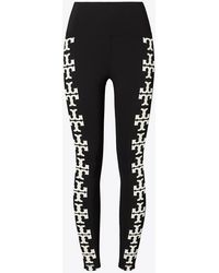 Tory Burch - Tory Burch Compression Logo 7/8 Legging - Lyst