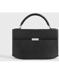 TOTEME - Clip Grained-Leather Top Handle - Lyst
