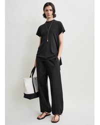 TOTEME - Drawstring Cotton Trousers - Lyst