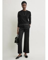 TOTEME - Kick Flare Raw-Edge Trousers - Lyst