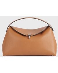 TOTEME - T-Lock Grained-Leather Top Handle Tan - Lyst