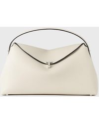 TOTEME - T-Lock Grained-Leather Top Handle Milk - Lyst