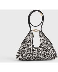 TOTEME - Bevel Floral Wristlet - Lyst