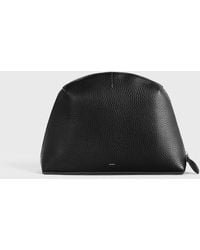 TOTEME - Medium Grained-Leather Day Pouch - Lyst