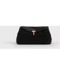 TOTEME - Mini T-Lock Woven-Leather Clutch - Lyst