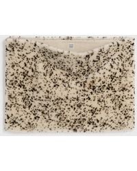 TOTEME - Stracciatella Shearling Muff - Lyst