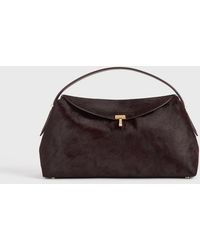 TOTEME - T-Lock Pony Hair Top Handle - Lyst