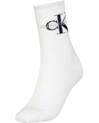 Crew logo chaussettes hes Jean Calvin Klein en coloris Blanc Femme Vêtements Chaussettes & Bas Chaussettes 