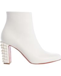 louboutin white boots