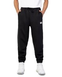 naaien Grondig helikopter Fila Pants, Slacks and Chinos for Men | Online Sale up to 79% off | Lyst
