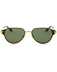 Bottega Veneta - Elegant Golden Metal Sunglasses With Lens - Lyst