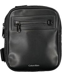 Calvin Klein - Sleek Urban Shoulder Bag With Contrast Details - Lyst