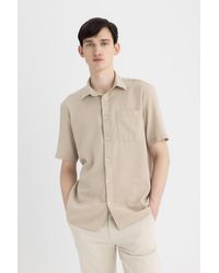 Defacto - Kurzarmhemd aus baumwolle mit polokragen und normaler passform - Lyst