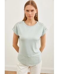 Olalook - Wasseres t-shirt mit guipure-detail - Lyst