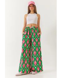 Bianco Lucci - Gemusterte Palazzo-Hose Aus Viskose Mit Elastischem Bund Und Schnürtaschen Für Damen - Lyst