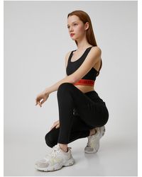 Koton - Sport-leggings mit taschen, hoher taille und detaillierter naht - Lyst