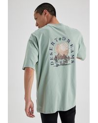 Defacto - T-shirt mit rundhalsausschnitt und aufdruck auf der rückseite, kurzärmlig, 100 % baumwolle, übergröße w8282az23sm - Lyst