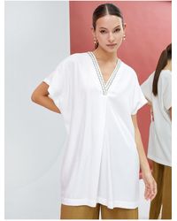 Koton - Lange Tunika Mit Kurzen Ärmeln Und V-Ausschnitt. Detailliert Für Damen - Lyst