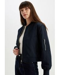 Defacto - Wasserabweisende Bomberjacke Mit College-Kragen, Reißverschluss Und Taschen – C4550Ax24Wn Für Damen - Lyst