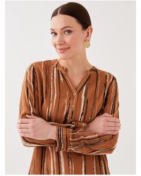 LC Waikiki - Gemusterte bluse mit lockerem kragen und langen ärmeln - Lyst