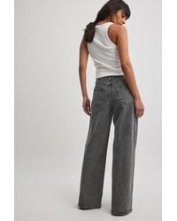 NA-KD - Jeans mit niedriger taille und weitem bein und nahtdetails - Lyst