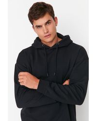 Trendyol - Es oversize/weit geschnittenes basic-sweatshirt mit kapuze und fleecefutter - Lyst