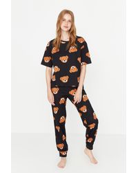 Trendyol - Es strick-pyjama-set aus 100 % baumwolle mit teddybär-muster, t-shirt und hose - Lyst