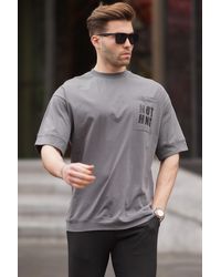 Madmext - Geräuchertes oversize-t-shirt mit taschendetail - Lyst