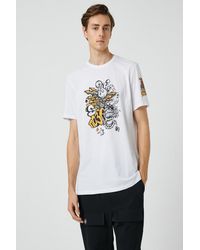 Koton - Bedrucktes t-shirt mit rundhalsausschnitt und kurzen ärmeln - Lyst