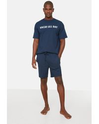 Trendyol - Marineblaues pyjama-set mit aufdruck und shorts in normaler passform - Lyst