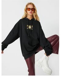 Koton - Übergroßes Sweatshirt Mit Bedruckter Kapuze, Taschendetail Und Fleece-Innenseite Für Damen - Lyst