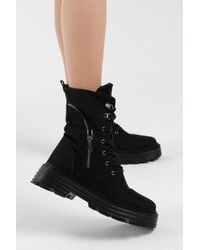 Tonny Black - Stiefel Aus Schwarzem Wildleder Mit Poly-Sohle Und Reißverschluss, Detaillierte, Bequeme Schnürstiefel Für Damen - Lyst