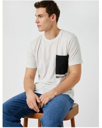 Koton - T-shirt mit slogan-print und taschendetail am rundhalsausschnitt - Lyst