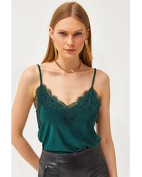 Olalook - Bluse mit smaragdem riemen, verstellbar, gerüscht, fließend, gestrickt, tank-top, bluse - Lyst